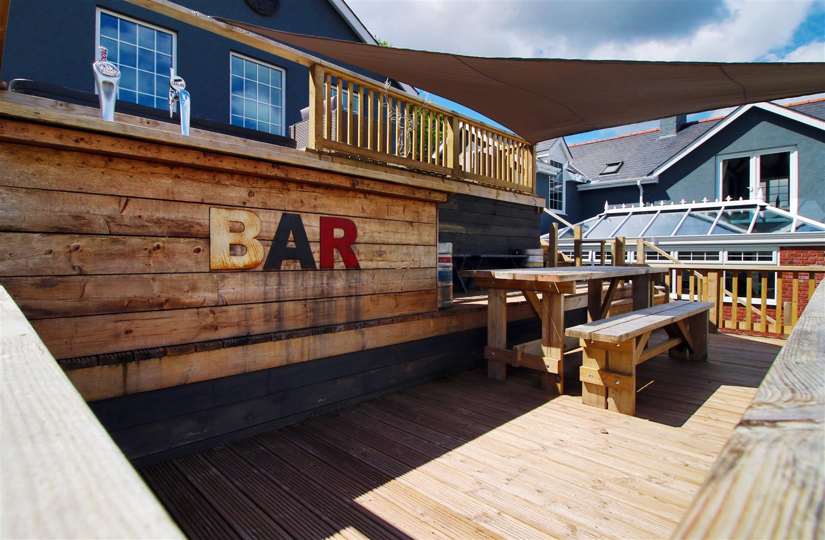 DECKED BALCONY AND PATIO